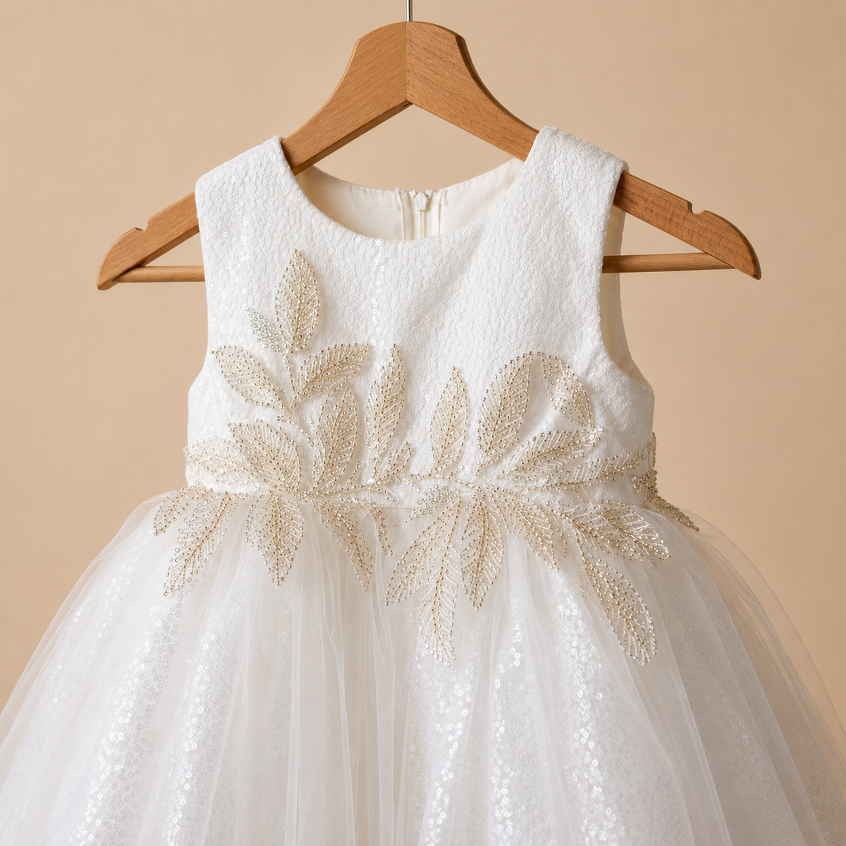 Robe baptême bébé ivoire broderies dorées feuilles jupe pailletée