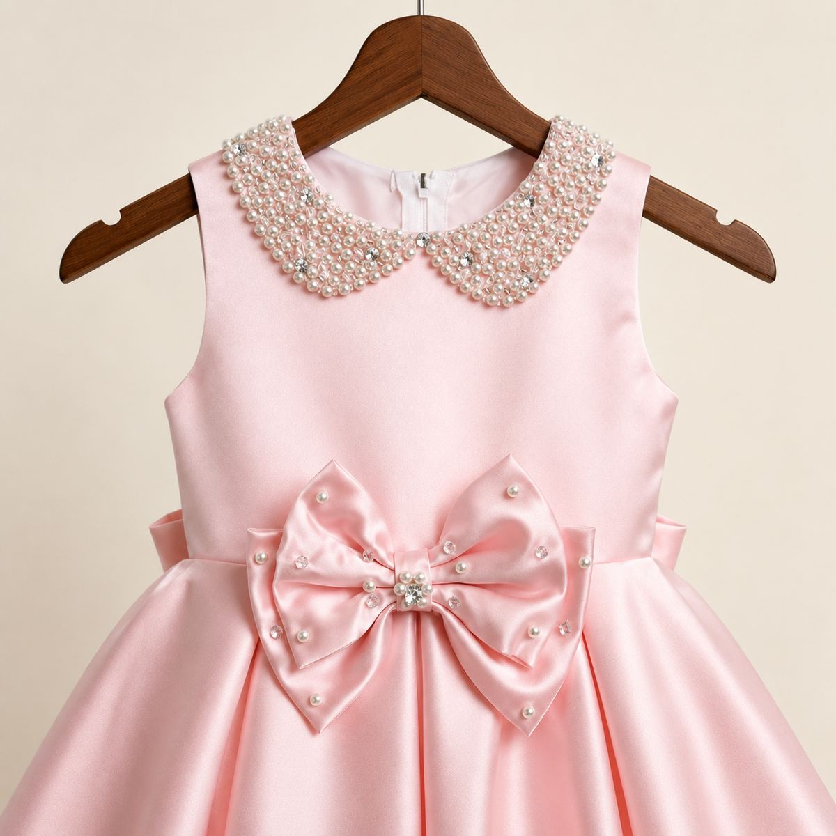 Robe bébé rose col Claudine perlé nœud ceinturé baptême cérémonie